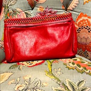 Made in Italy-Red Leather Clutch with multi-colored design in front.